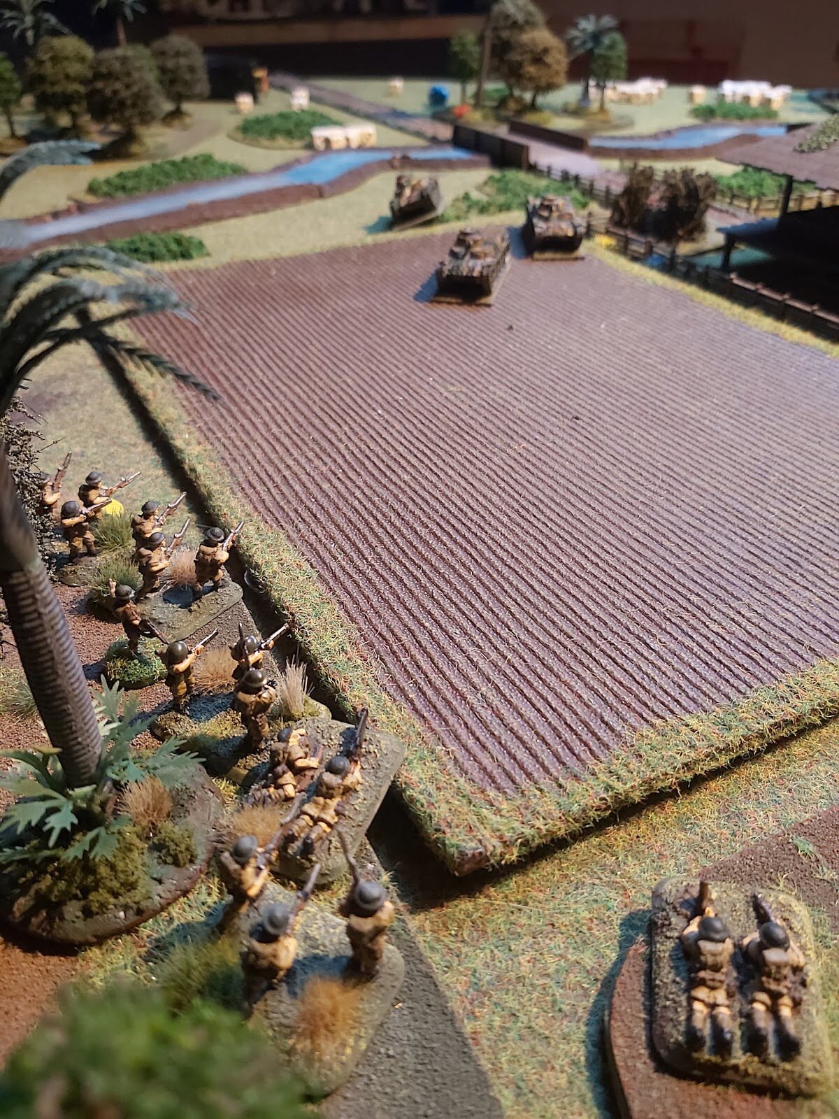 Heading towards the tree line, the tanks take ineffectual fire from the anti-tank rifles. 