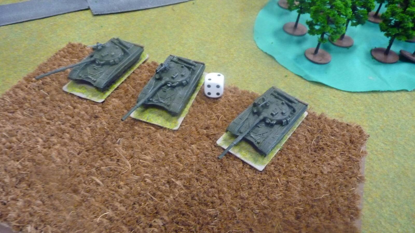 A Soviet tank platoon advanced on the left through a cornfield