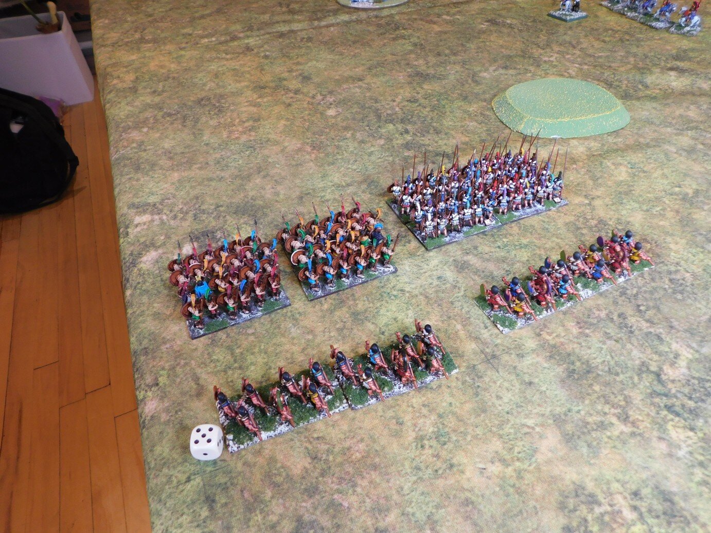 Two powerful Hoplite units, and their associated light infantry, face my battlecars