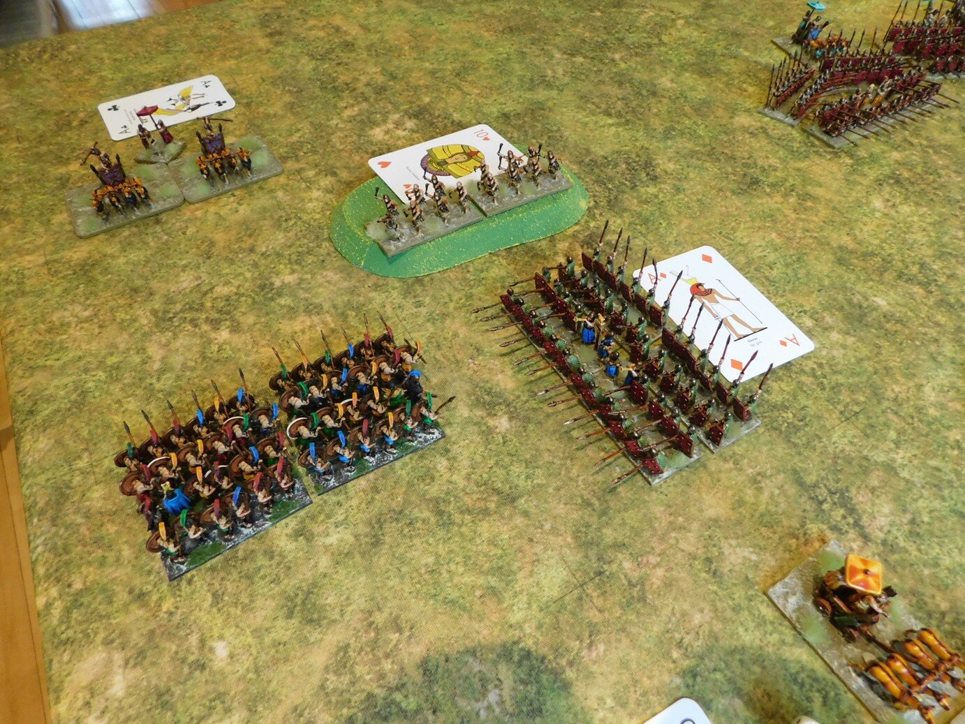 One unit of Hoplites taken out by the second line of battlecars. City militia again fail to charge a flank.
