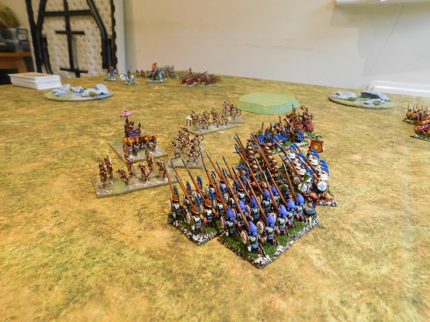 The Royal Guard axemen are all dead, but they have done enough damage to the reserve Hoplites to let the Royal Guard archers finish them off.