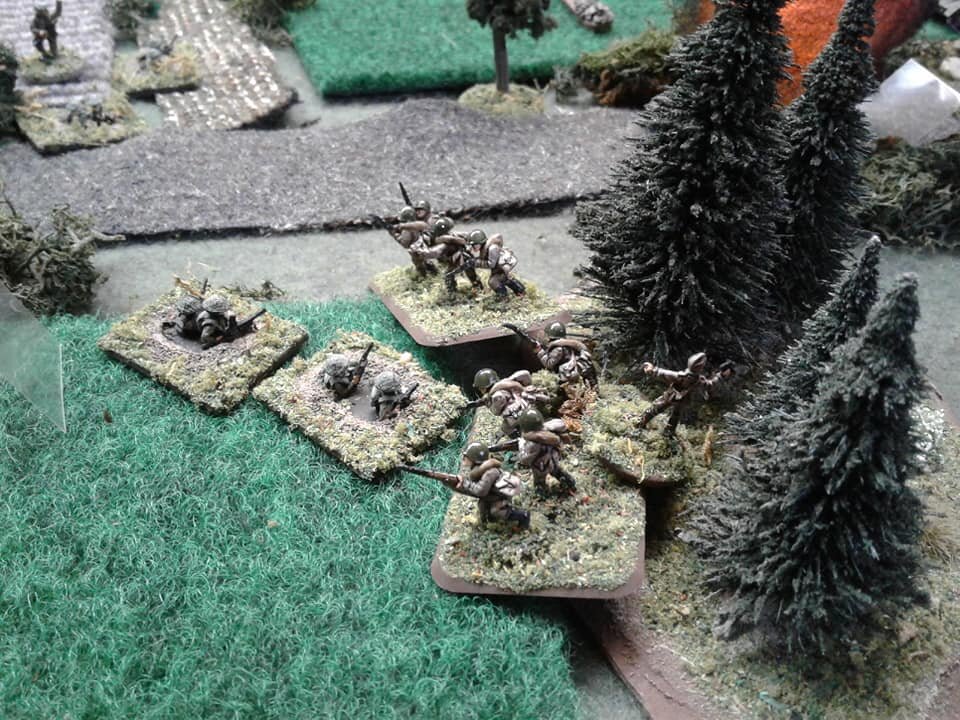 Surprise! Bordurians try to close assault the slit trenches around the crossroad