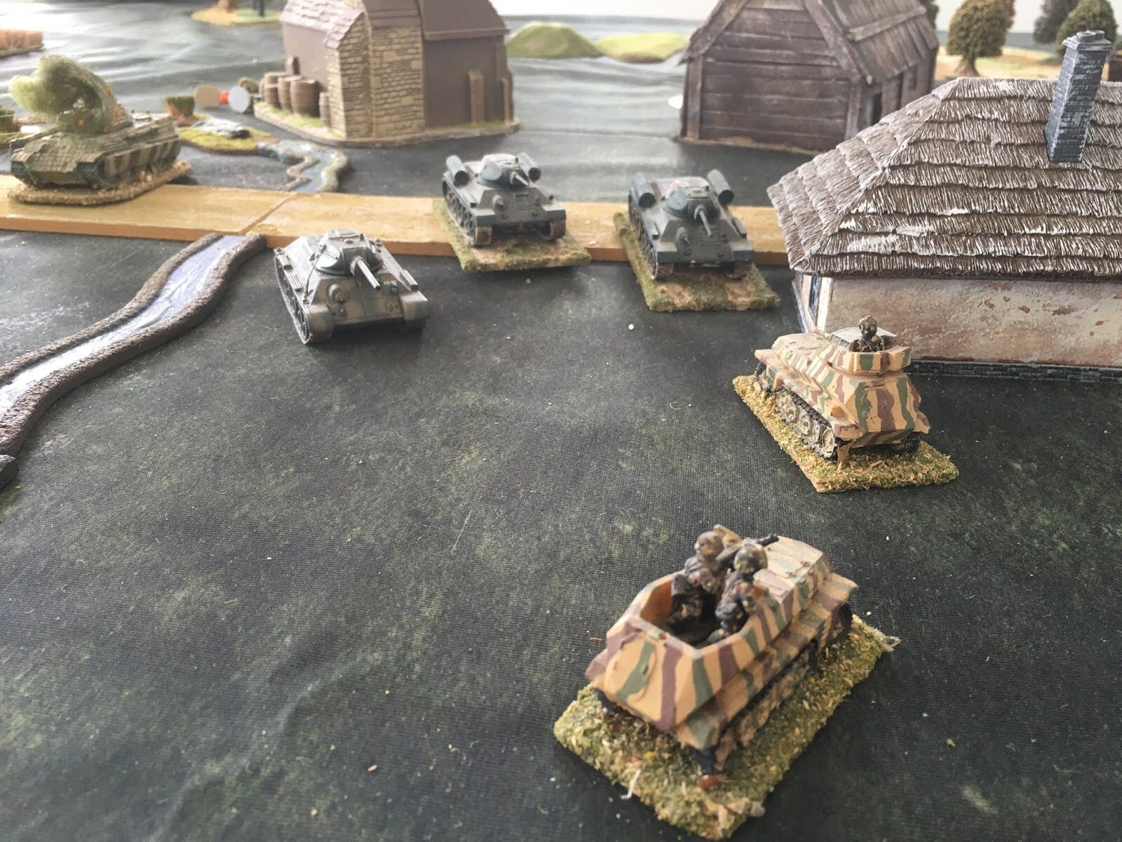...but the T-34s are picking off the Panzers and then turn on the smaller recce vehicles