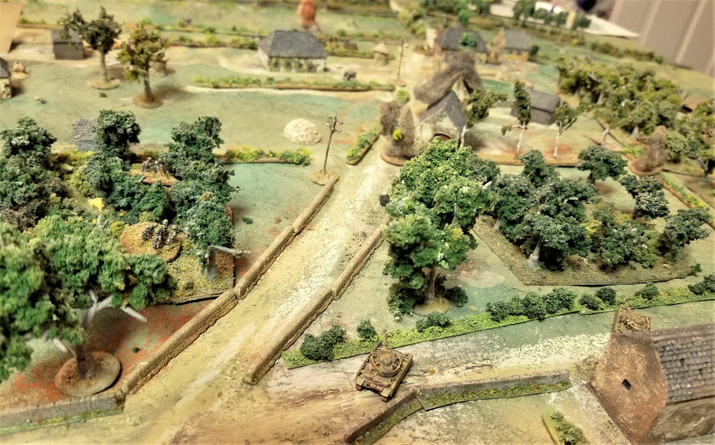Panzers on the path and grenadiers in the orchard