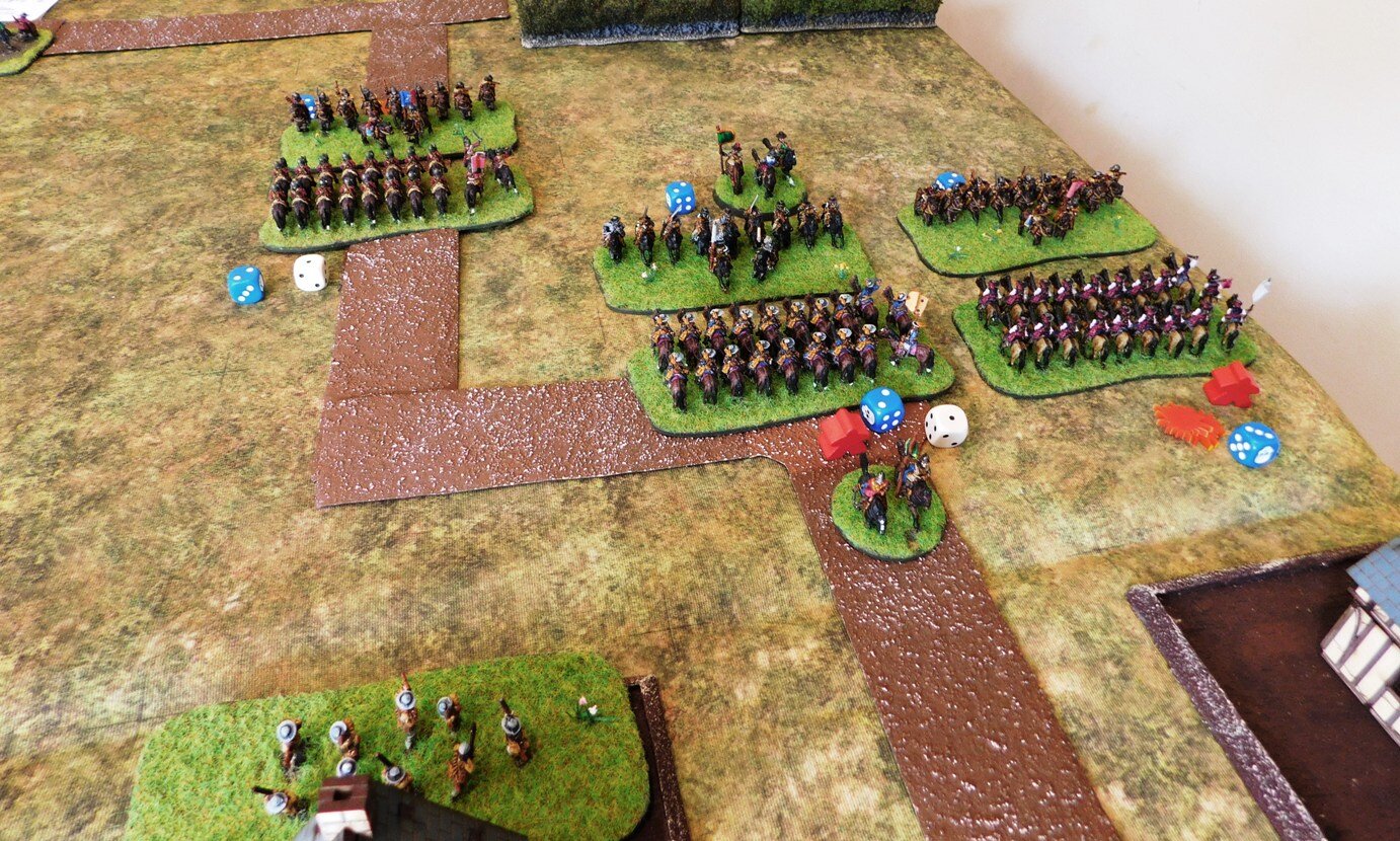 A massive cavalry clash on the right. My right hand unit is in trouble. 