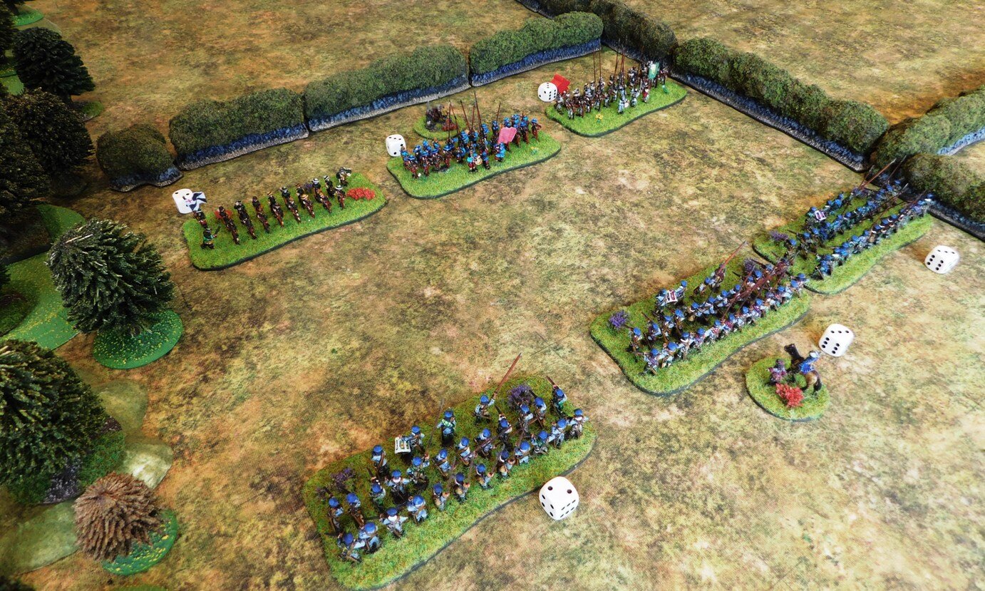 The Royalists jump the hedge and advance towards the waiting Scots.