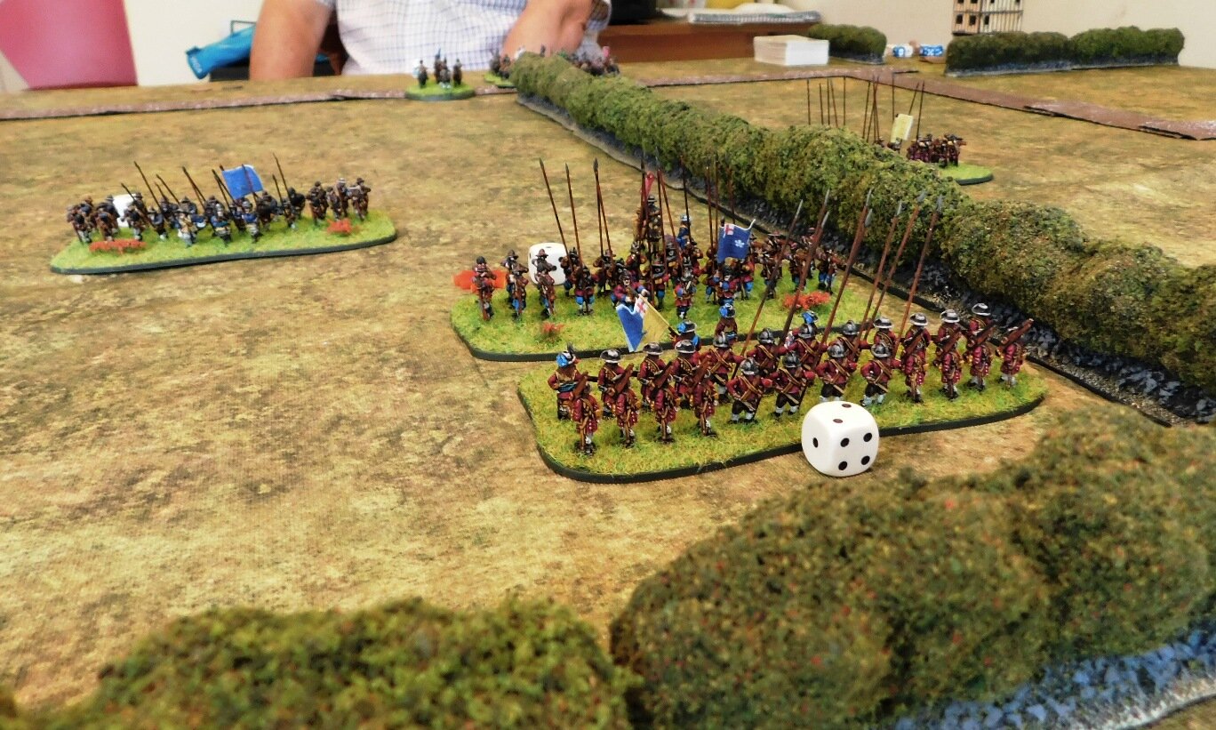 Whilst the 1st Maidenhythe Foot attempts to hold off two battalia of enemy pike