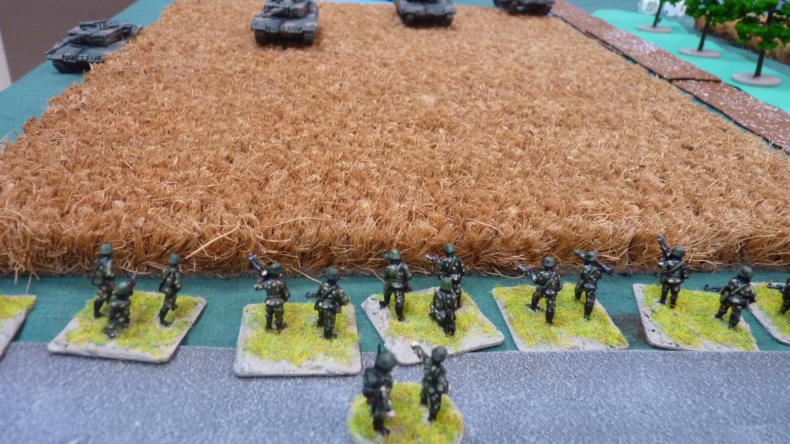 Excellent German optics revealed a Soviet infantry platoon lying in wait on the other side of the field.