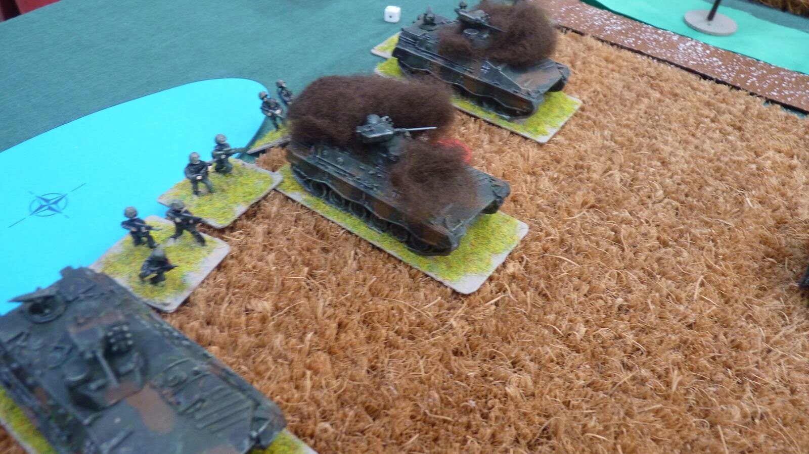 The panzergrenadiers had left their carriers just in time as RGPs found their targets and put a pair of Marders out of the battle and inflicting shock on the infantry they had been supporting.