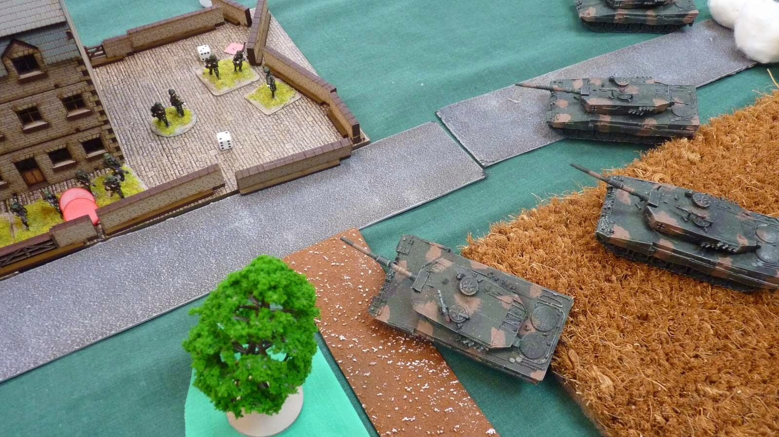 Close range firing by the tanks sent one Soviet section reeling back.