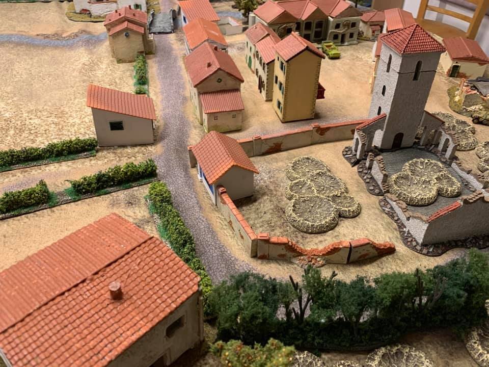  Church:  Battlefront Churchyard walls, ruined building just to right of spire, building to right of town hall:  tabletop-art.de resin Single story barn just N of that:  Najewitz 3D print courtesy of Tom Grenfell (as is the building hidden by the spi