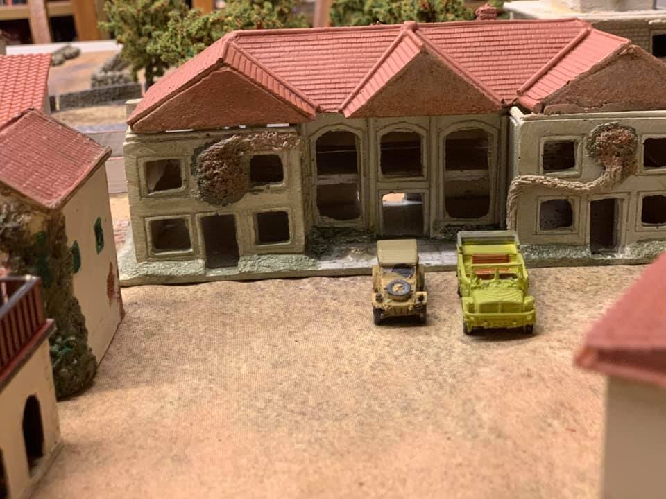  Town hall:  unknown ebay resin. Building with balcony:  Empires at War Building with creeper (centre left):  CR Ninive resin Kubelwagen and staff car:  3D prints from  https://www.thingiverse.com/m_bergman  designs 