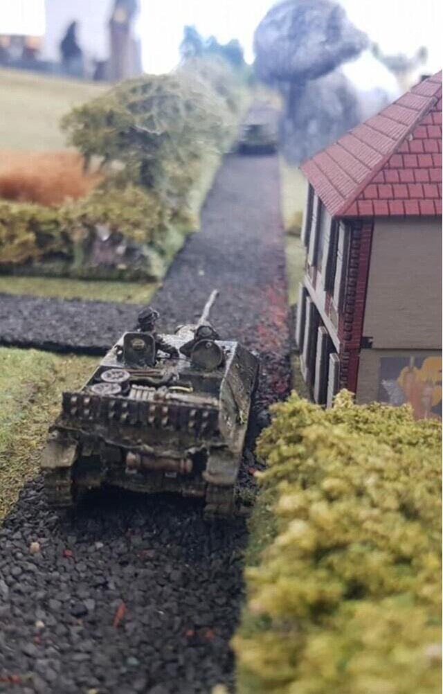 JagdPanzer IV of support platoon knocked out a Cromwell at long range.