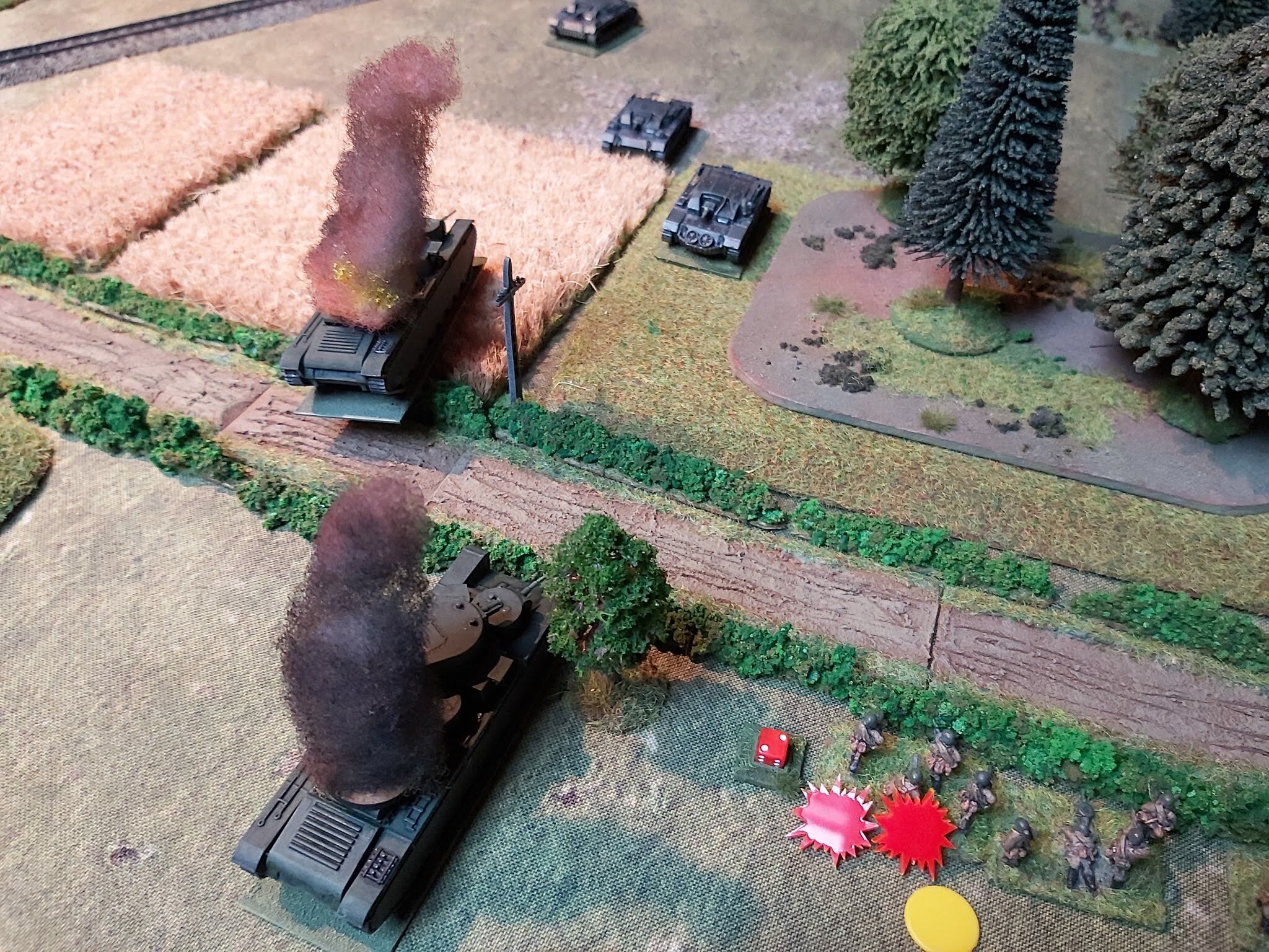 The StuGs were having a field day, brewing up the second T-35 and laying fire down on the Russian section holding the hedge line. 