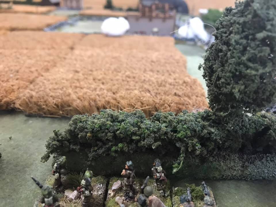  Platoon C is deployed (spotted by the German CO in the two storey building) . 2” mortar deploys smoke in preparation for the next move forward. 