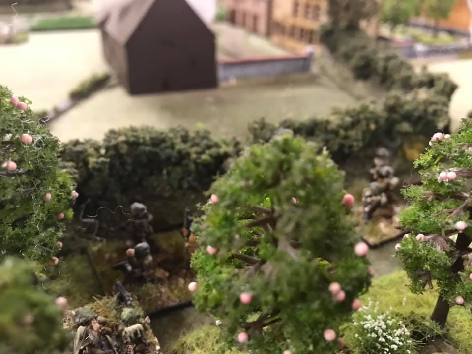  Platoon A prepares to take Le Bleu Ferme. The barn is in fire from the barrage. 