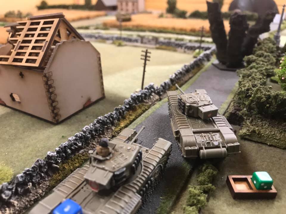  The duel with the StuGs went on all game. The low silhouette made them hard to hit, and the dice kept netting out at 0 or 1 hit only. 