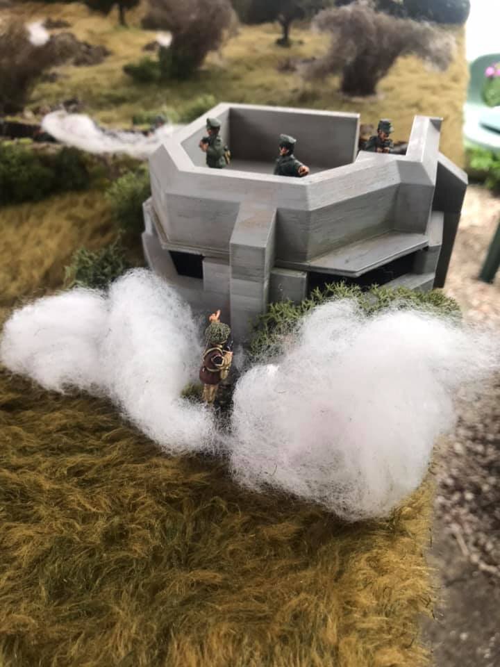 CSM Attacks the bunker through a smoke screen laid down by Platoon 2" mortar.
