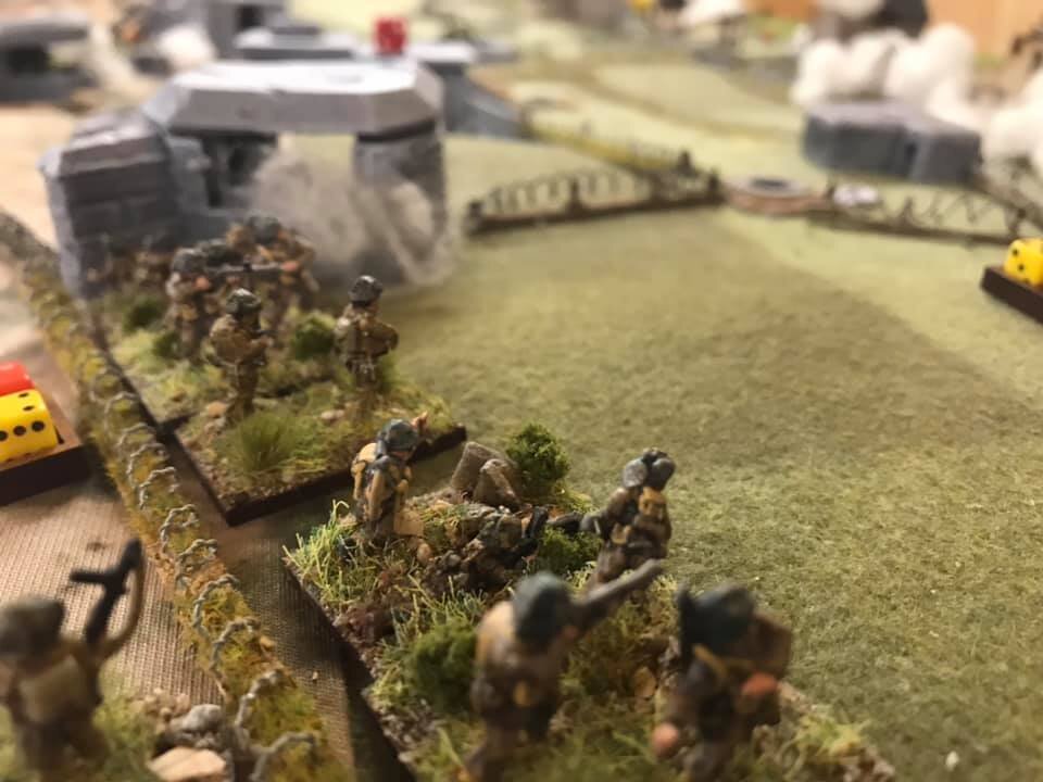 Iain's platoon storm Cod and give it a battering.