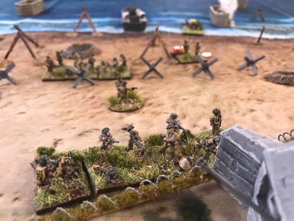 Platoon C assaults Cod, the wire caused delays in attacking the first AT bunker.