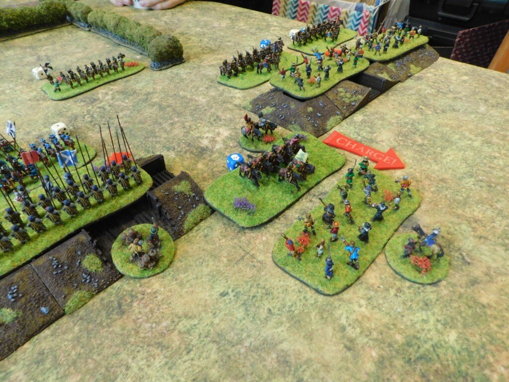 But, before the centre and left can move forward, more Royalist horse attack the part-completed trenches on the right!