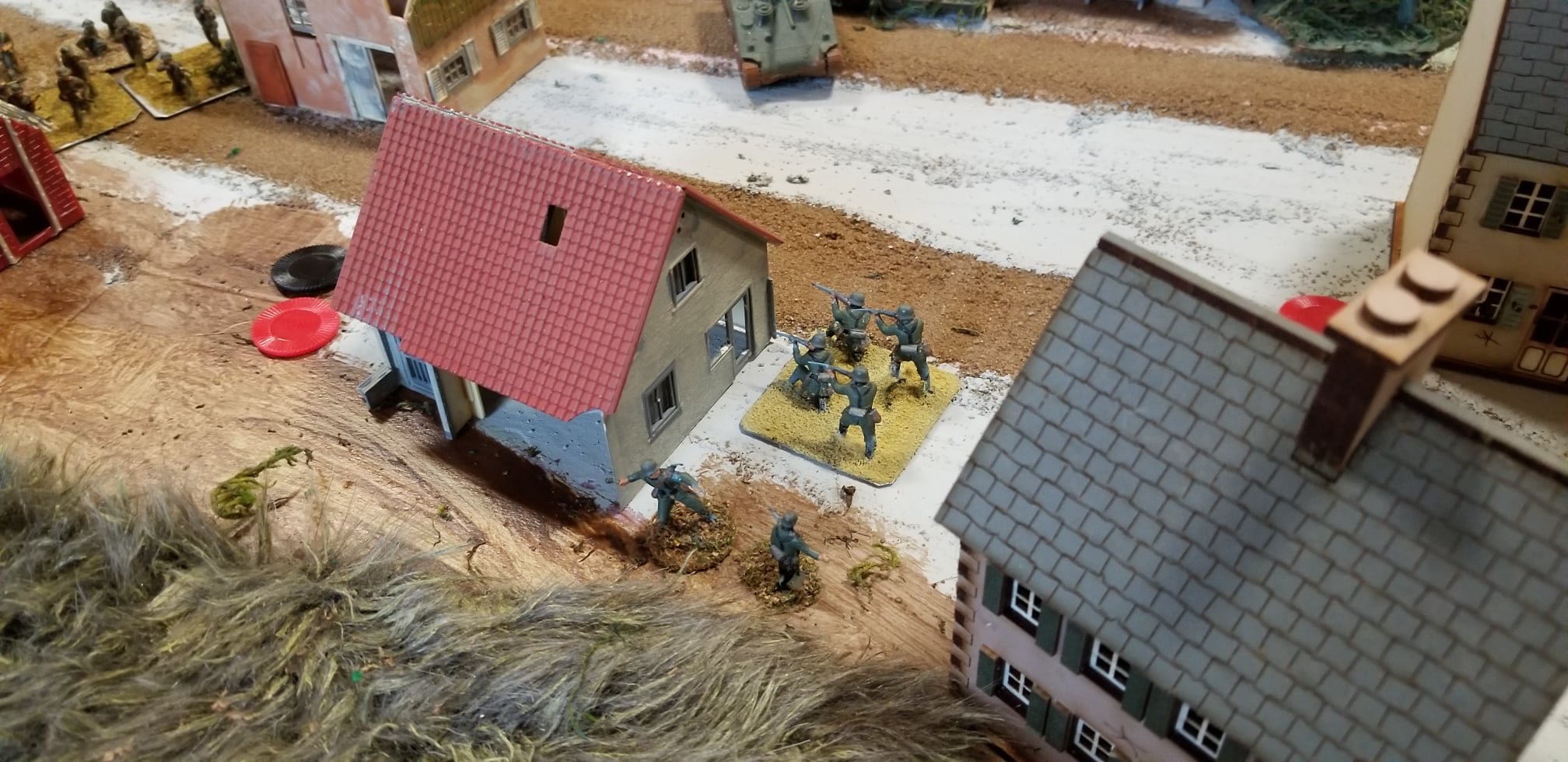 German infantry begin to take more houses.
