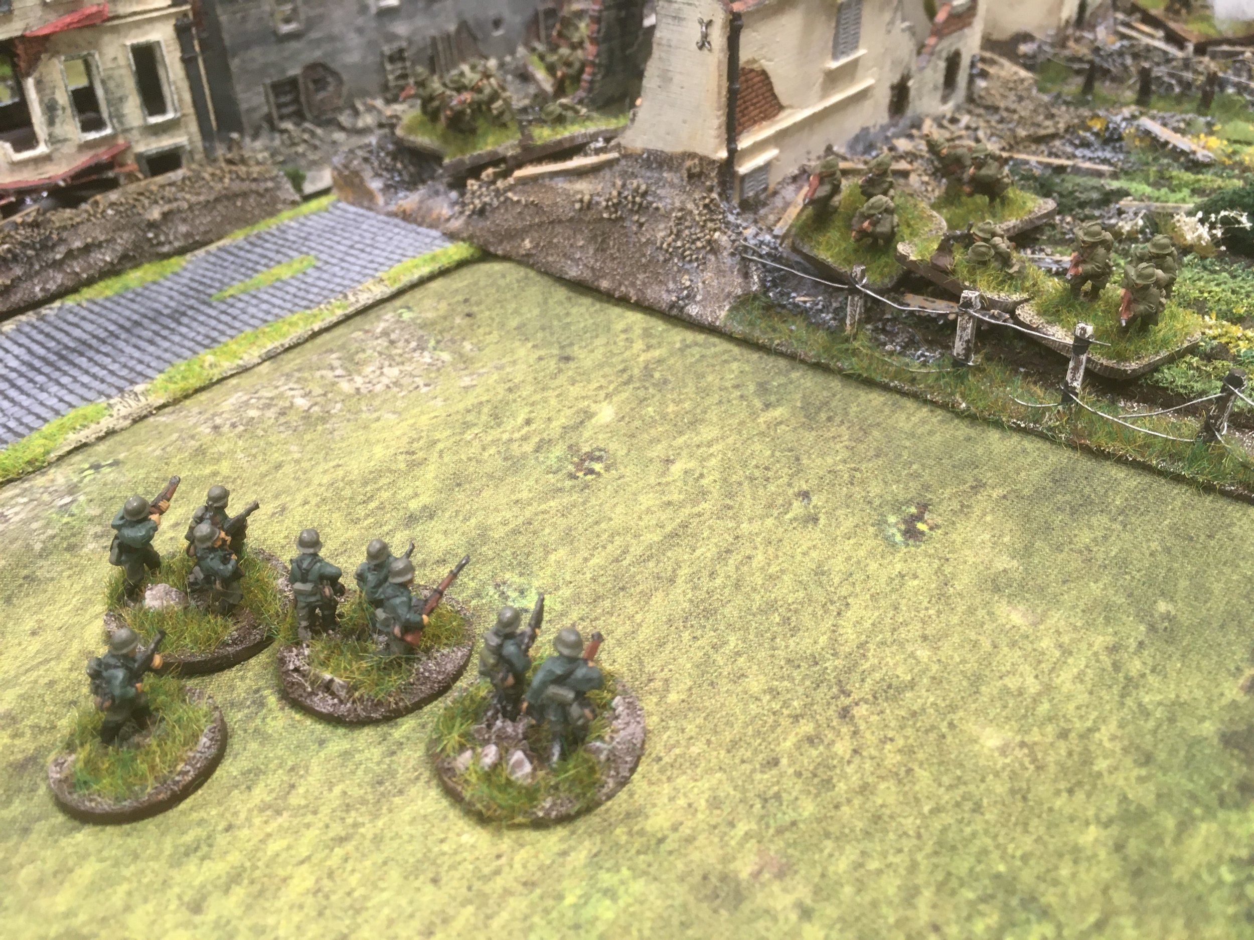 Into the face of sustained fire from a second French infantry platoon hidden in the ruins.