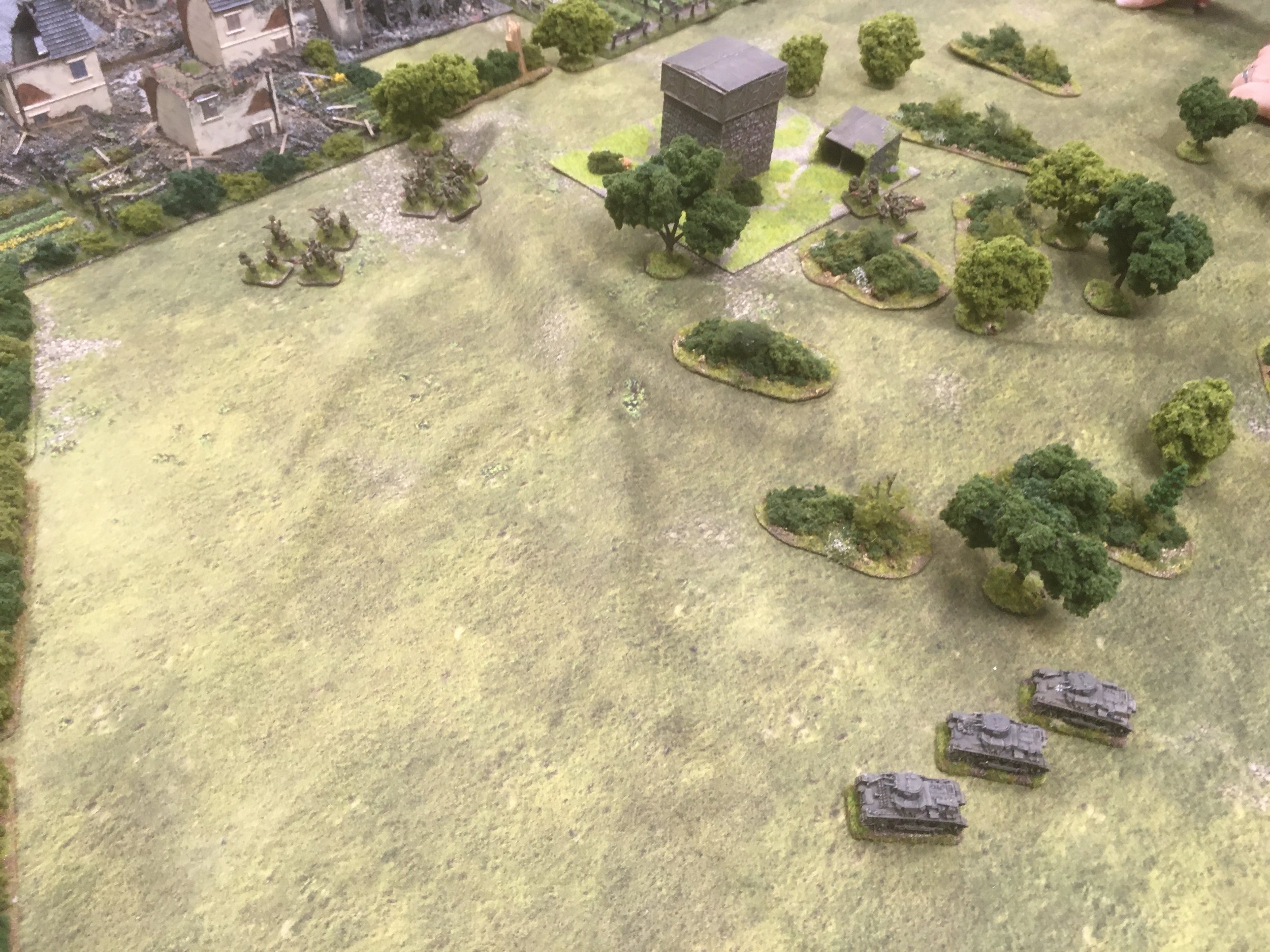 As the Panzer I's skirt around the wooded hill in an effort to catch the retreating French in open ground.