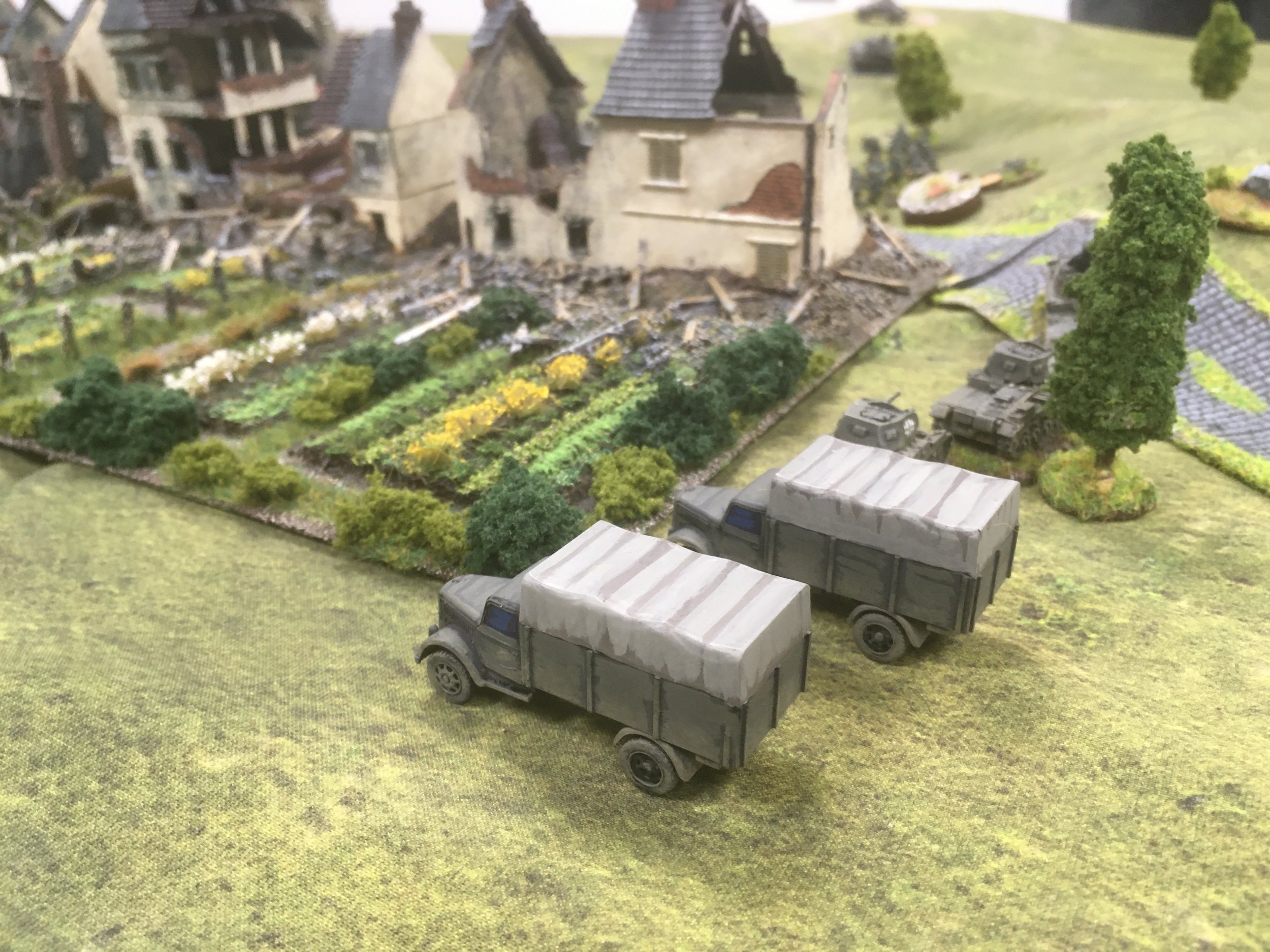 As two infantry platoons reach the outskirts of the town...