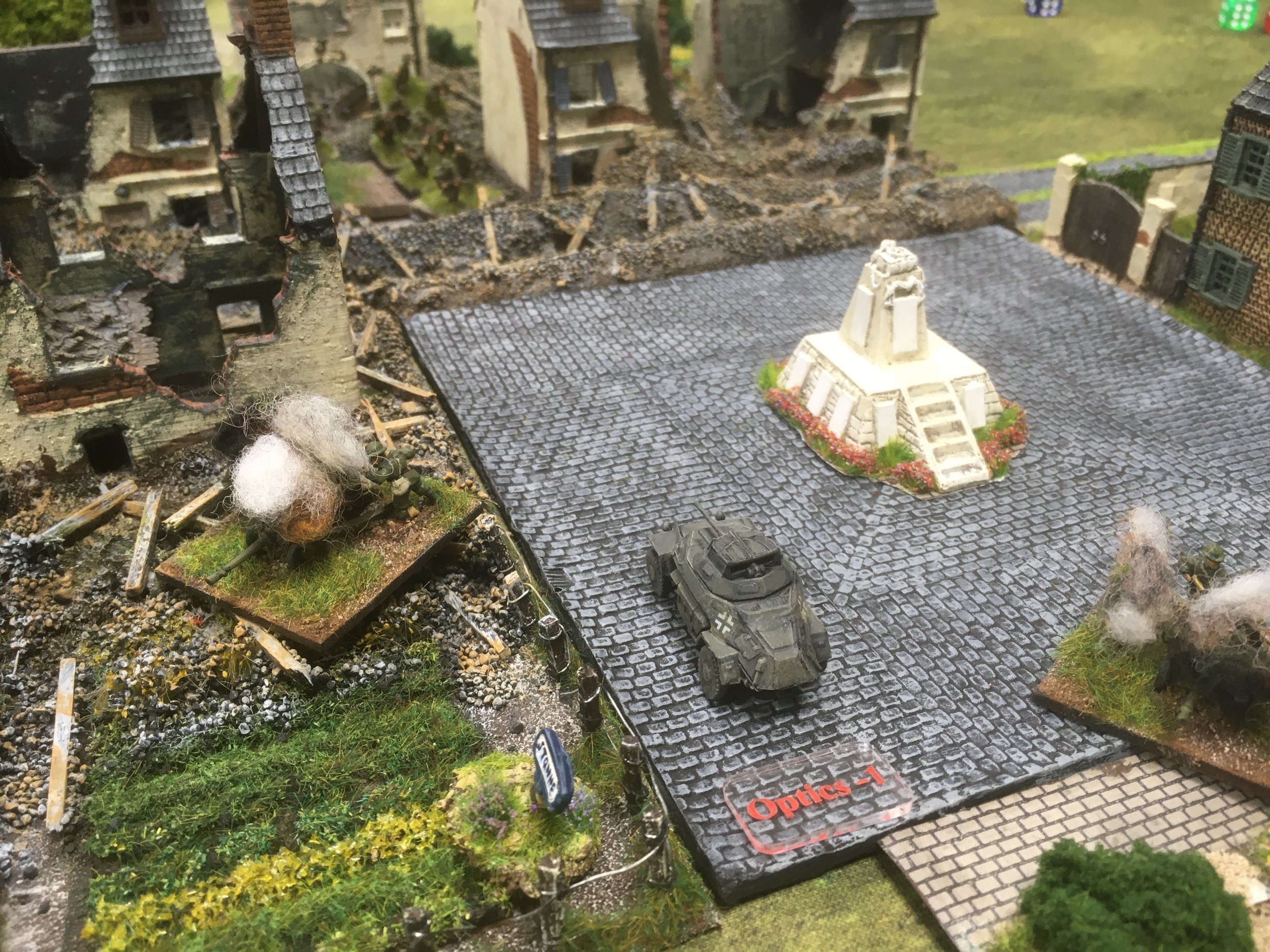As the Sd.Kfz 222 moves into the village square to uncover the final French 'blind' - which turns out to be a dummy.