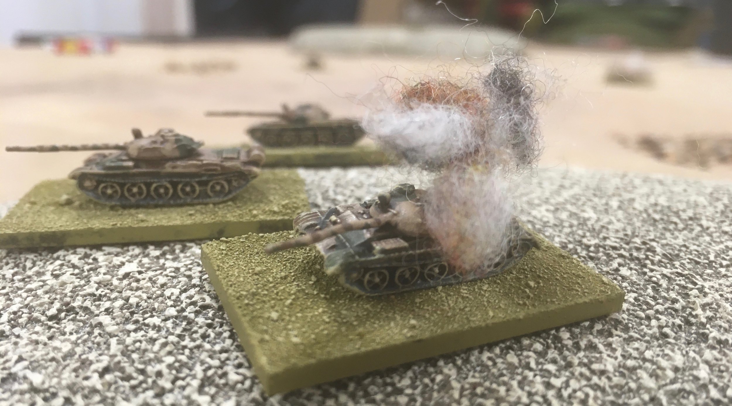 And slamming a round into the flank of one of the T-62's there.