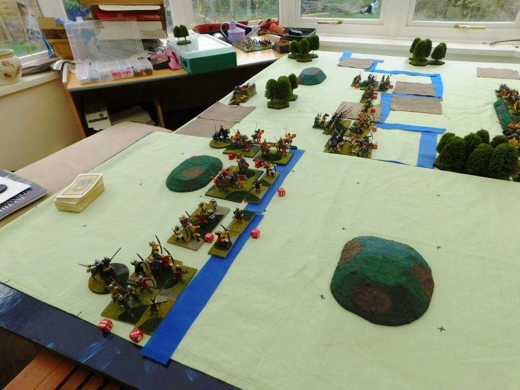  Here are the Welsh: a brigade of cavalry, then three mixed brigades of spearmen, bowmen and light bowmen.    As you can see, my plan is to use the stream running across the battlefield to give me the time I need to soften the English up with a storm