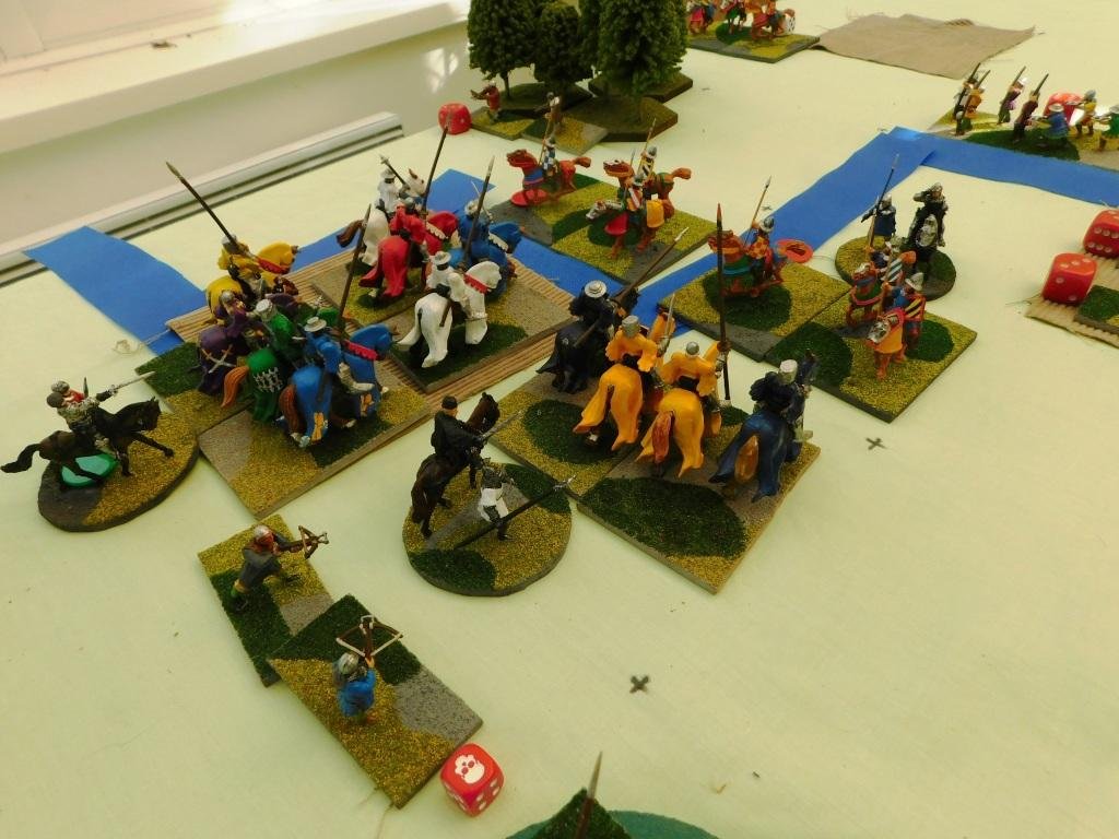  Timing -wise, my plan worked beautifully: my Knights did indeed hit the Welsh horse without taking a single casualty from bow fire.    The problem was in the execution: despite charging with lances and generals, I just couldn’t break the Welsh horse