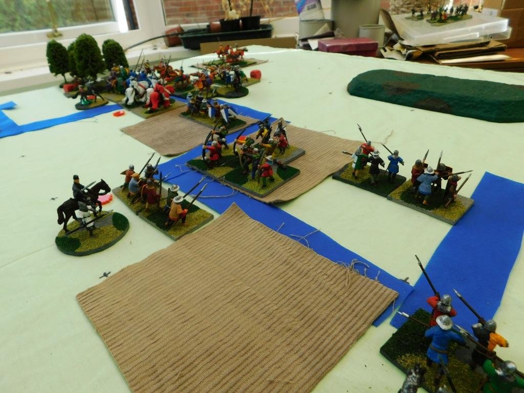  In the centre, however, things were going very much better.    Riding the “storm of arrows” from the Welsh archers, my spearmen had got in amongst them and were wreaking havoc. Perhaps all was not lost! 