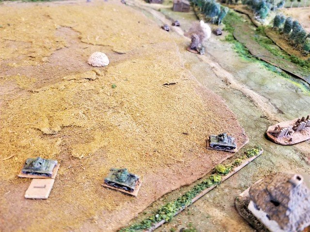 The T26s try to get around the left