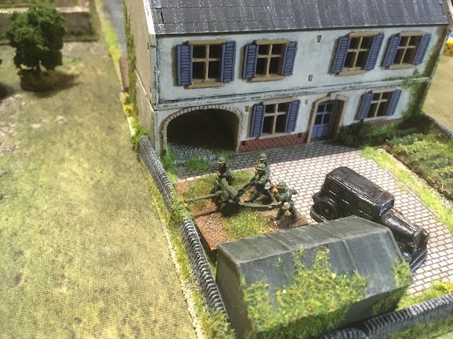 A second 25mm revealed itself further to the left of the town, but its shot at the advancing Panzer II's missed.