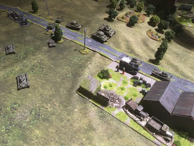 The Matilda I's swept around the garage moving towards the enemy infantry now on foot in the open...