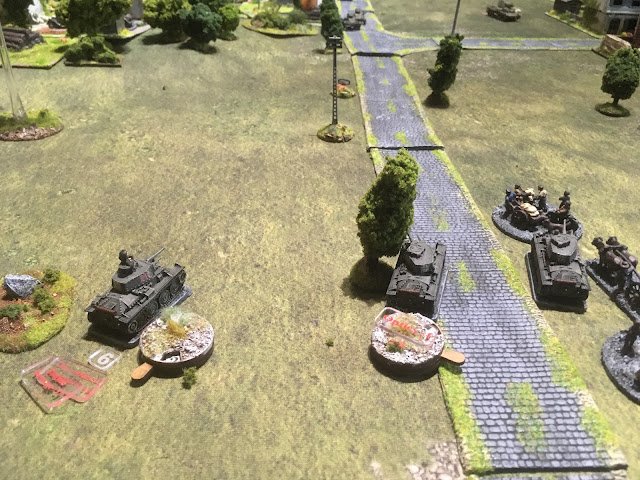 Return fire from the A9's hit the Panzer 38(t)'s inflicting some Shock on the platoon and immobilising the platoon commander's tank. 