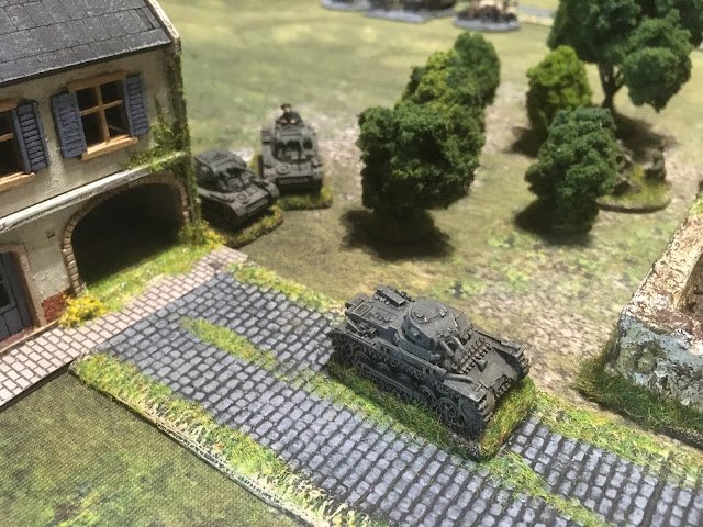 Whilst some newly arrived Panzer I's decided discretion was the better part of valour when your tank only has two machine-guns and hid.