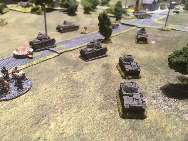 However this was becoming a tank battle and with the Panzer II's having destroyed the French anti-tank gun they brought their 20mm cannon to the party alongside the Panzer 38(t)'s...