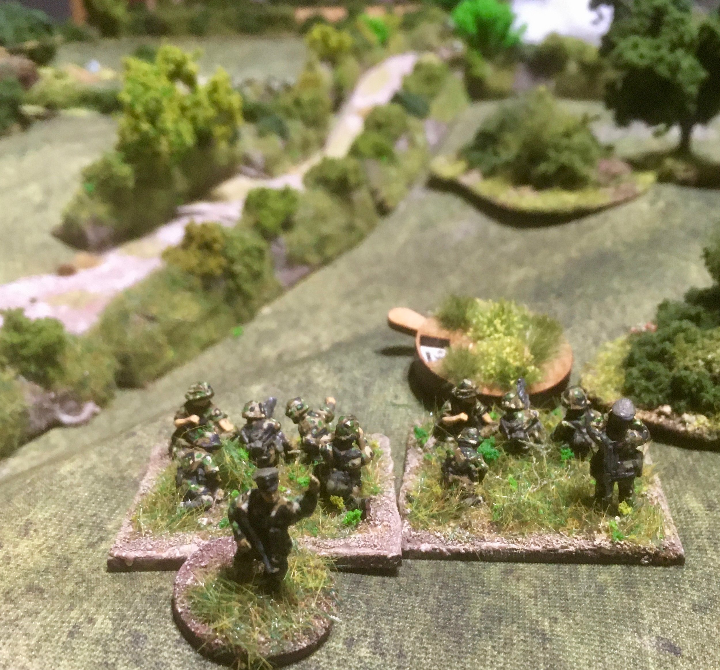 Having become unpinned, the German HMG's opened fire on the section in the hedgerow to their front...
