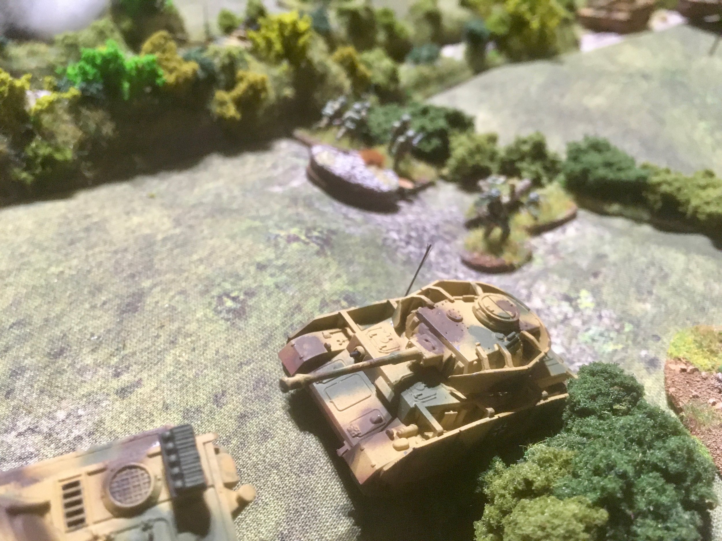 As the Panzers pushed past the remnants of the British troops on the German left, spraying them with machine-gun fire as they went...
