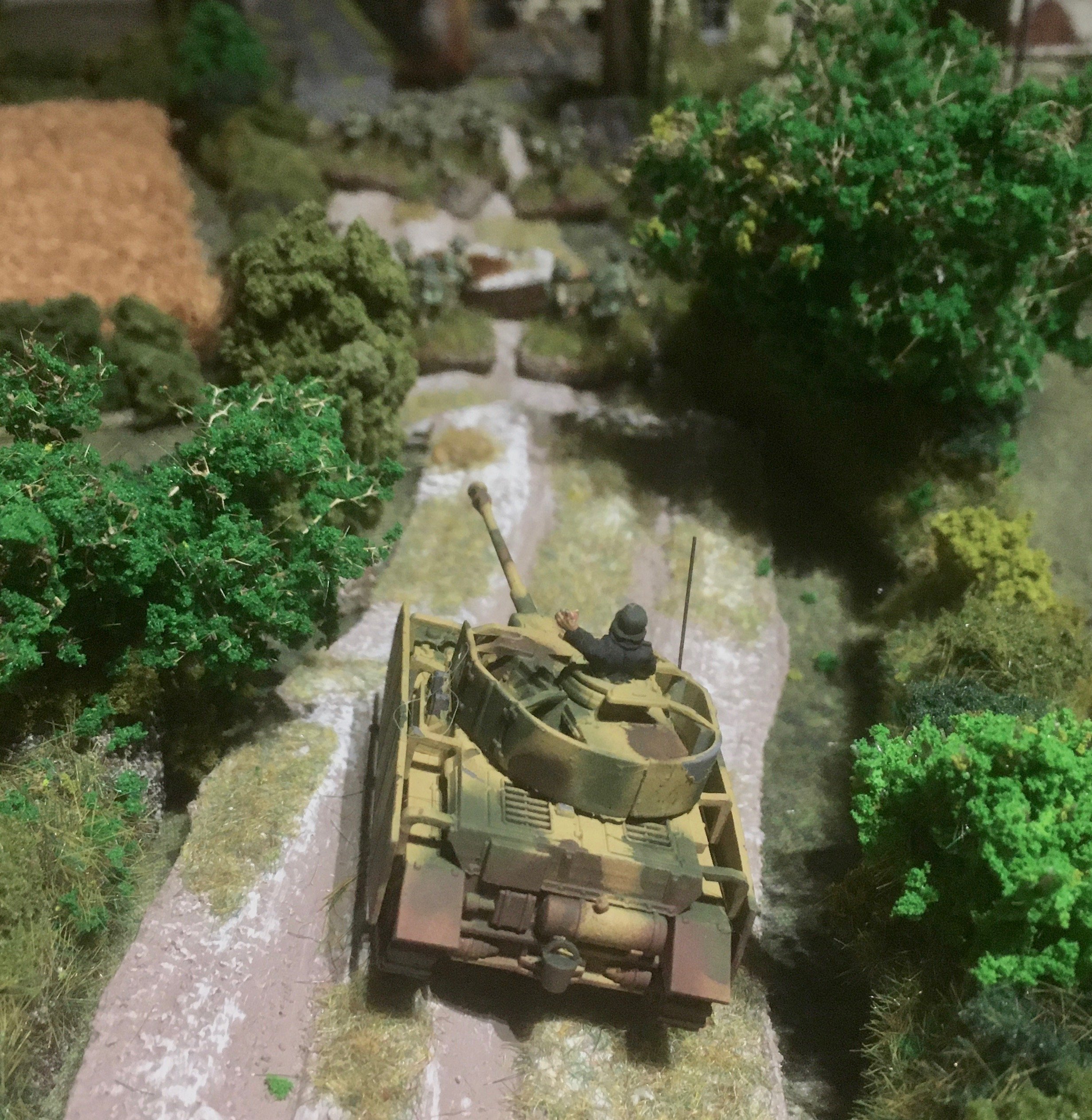 She pushed a Panzer IV down the road towards the enemy infantry...