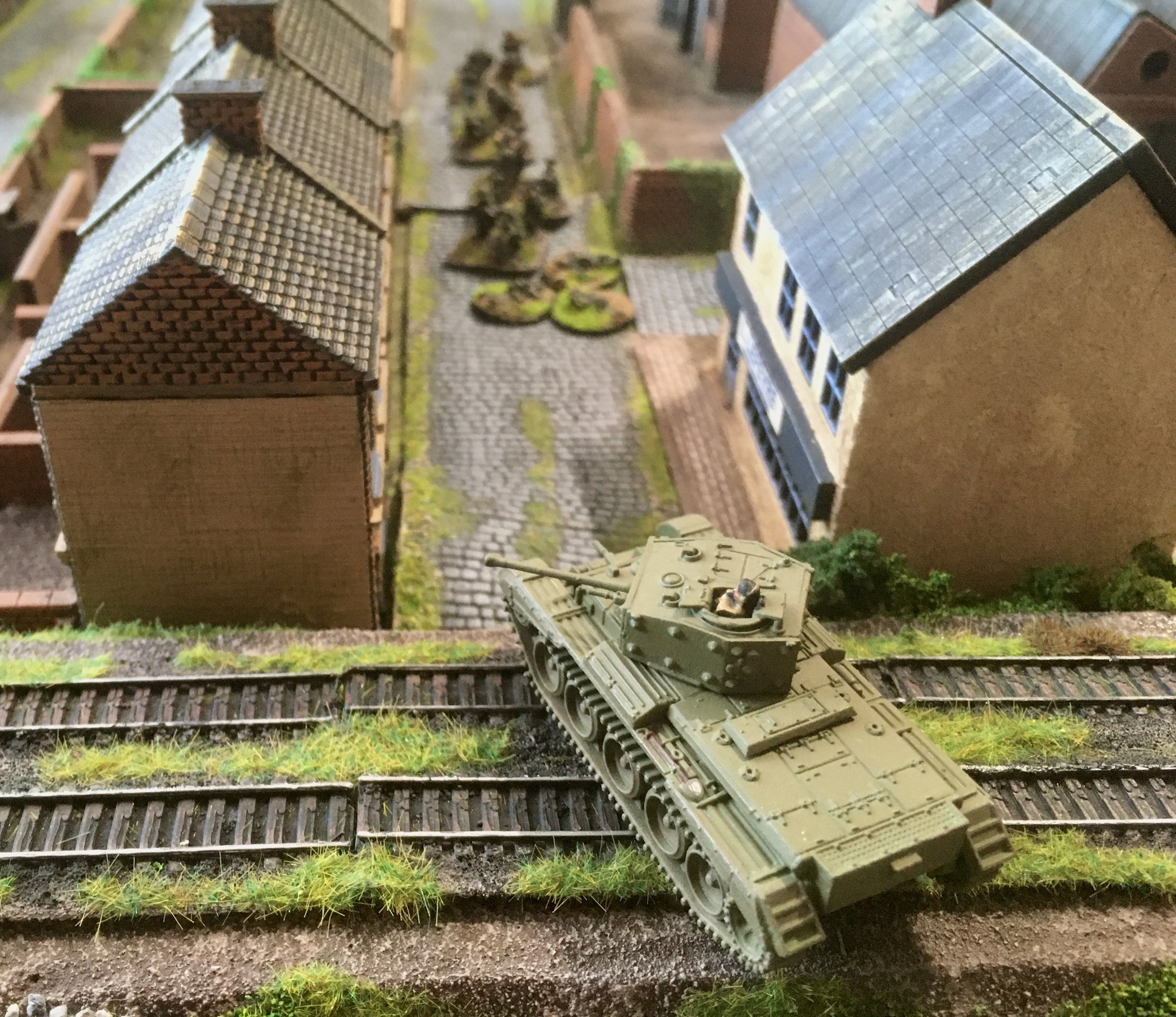 A third Welsh Cromwell then moved up the railway embankment, spraying the remaining Germans with more machine-gun fire...