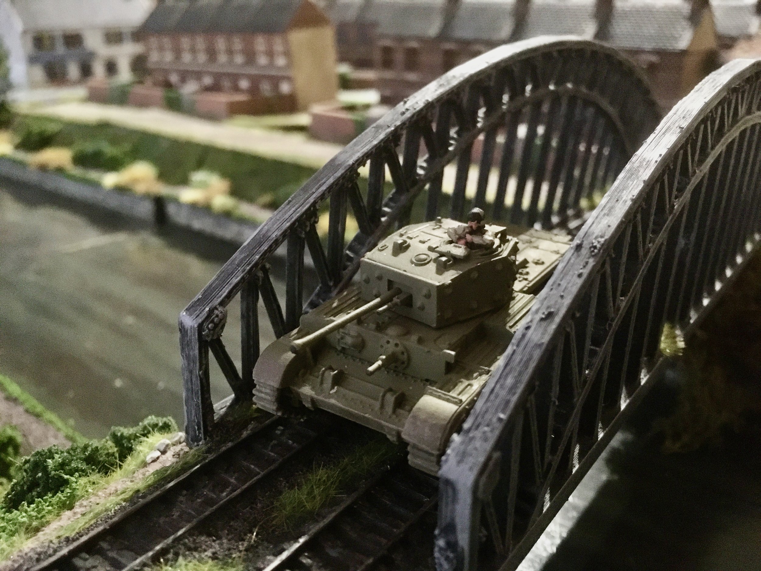 The first of its Cromwells crossing the railway bridge to the green fields beyond Halle! Brussels here we come!