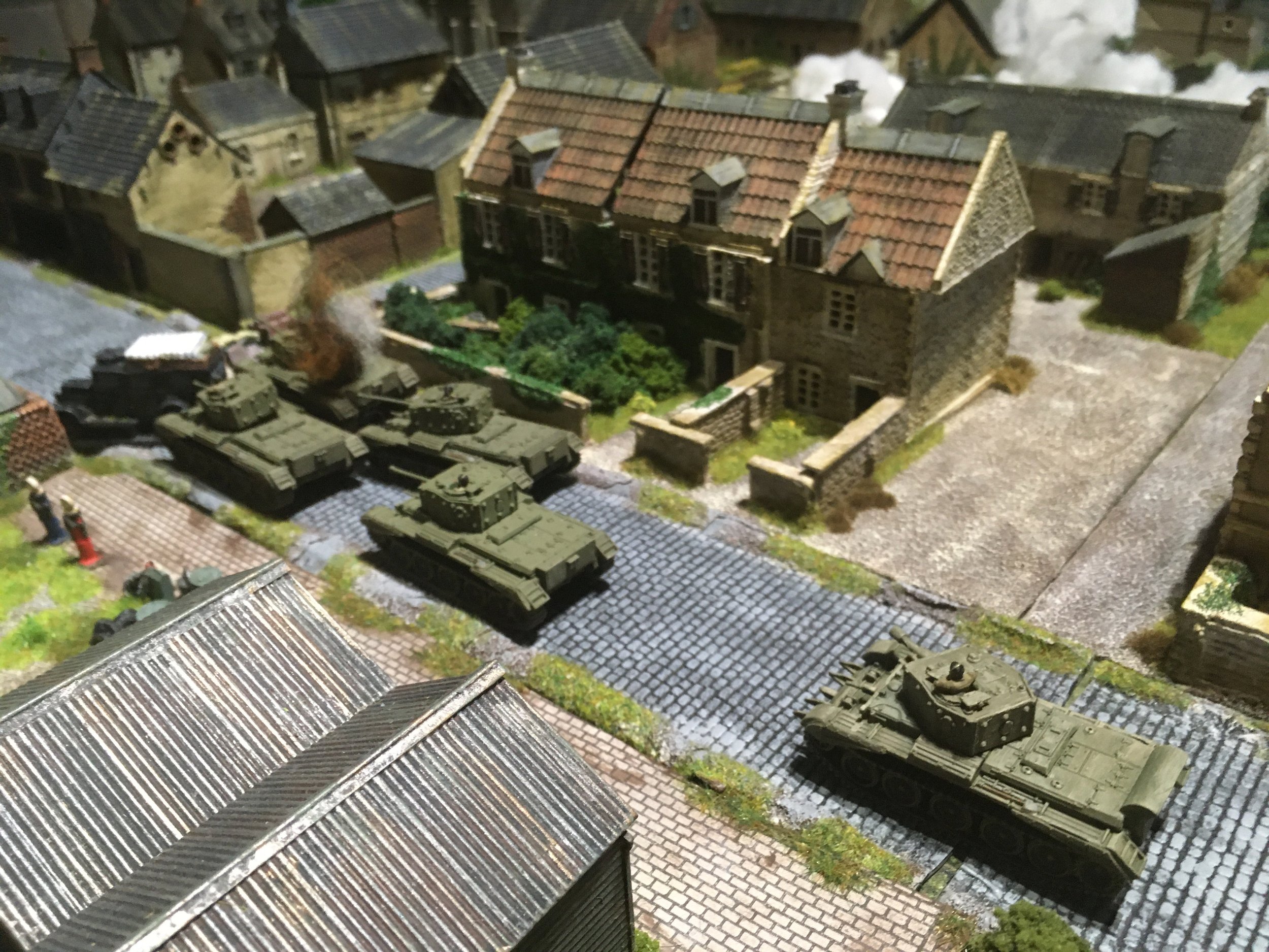 However in the centre, the Welsh HQ troop was now pushing through the German barricade.