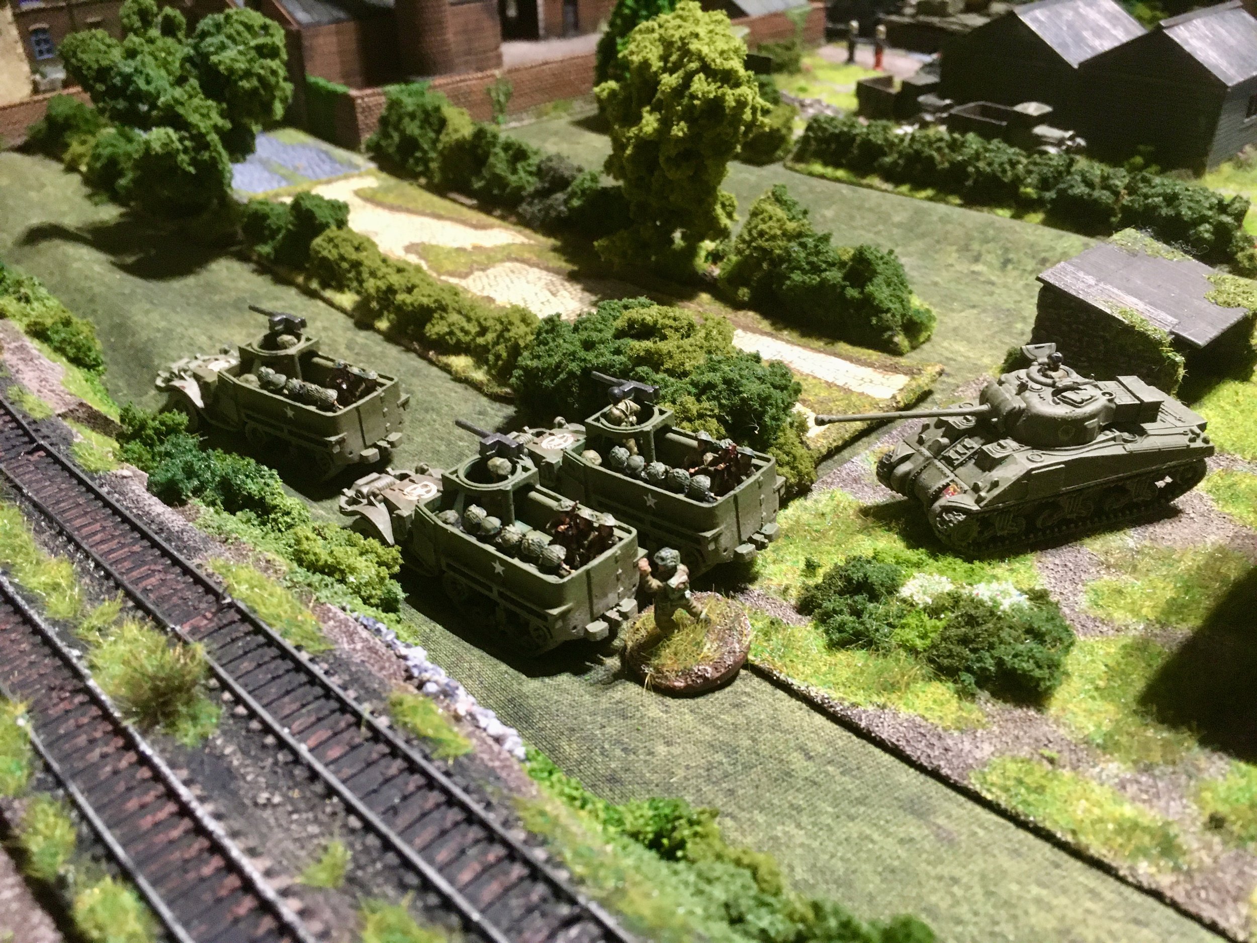 Whilst the first Grenadier Guards platoon and the original Welsh Firefly pushed up the left by the railway...