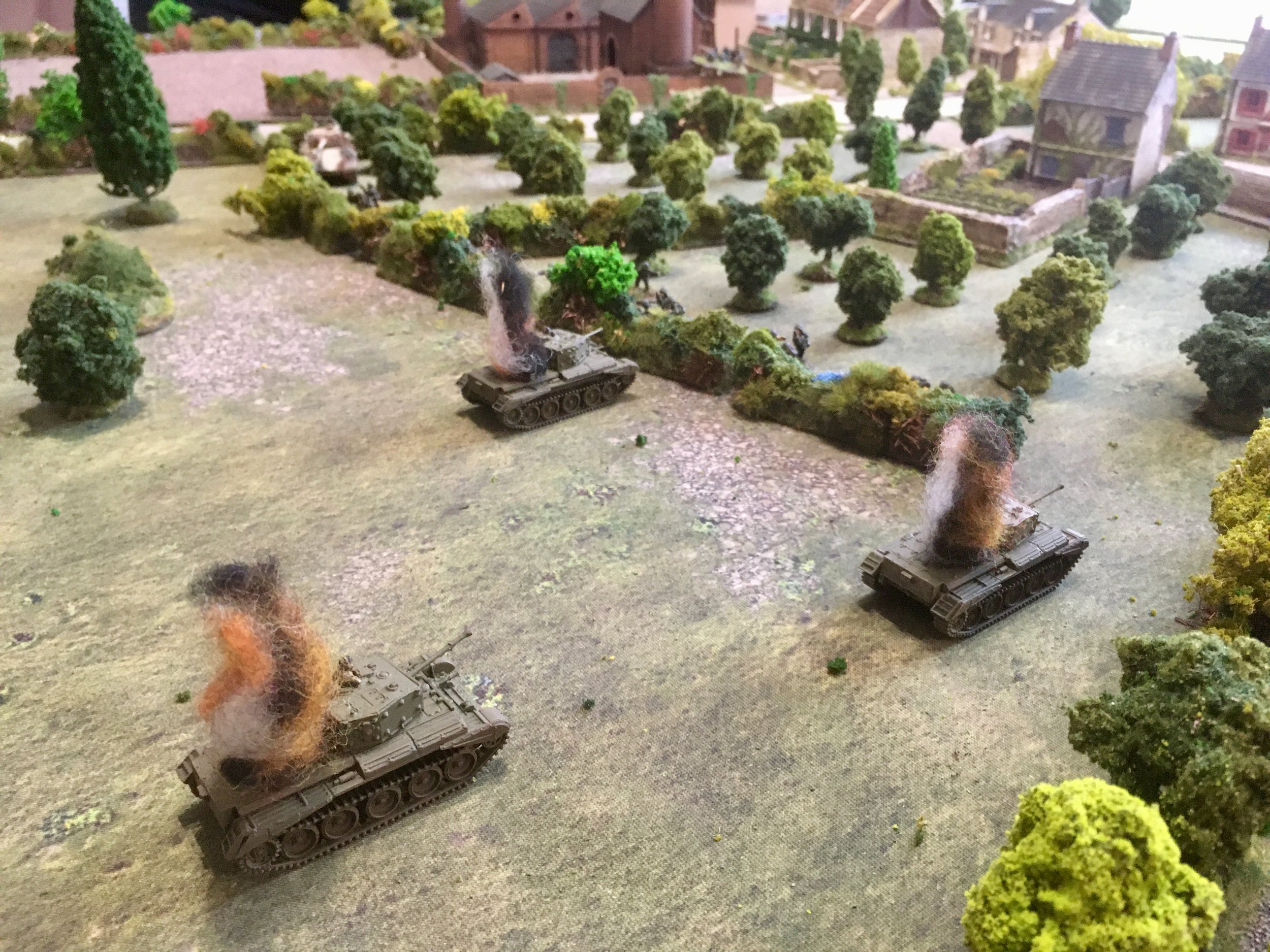 Whilst the third brewed up after a 75mm round from the Panther slammed into its flank!