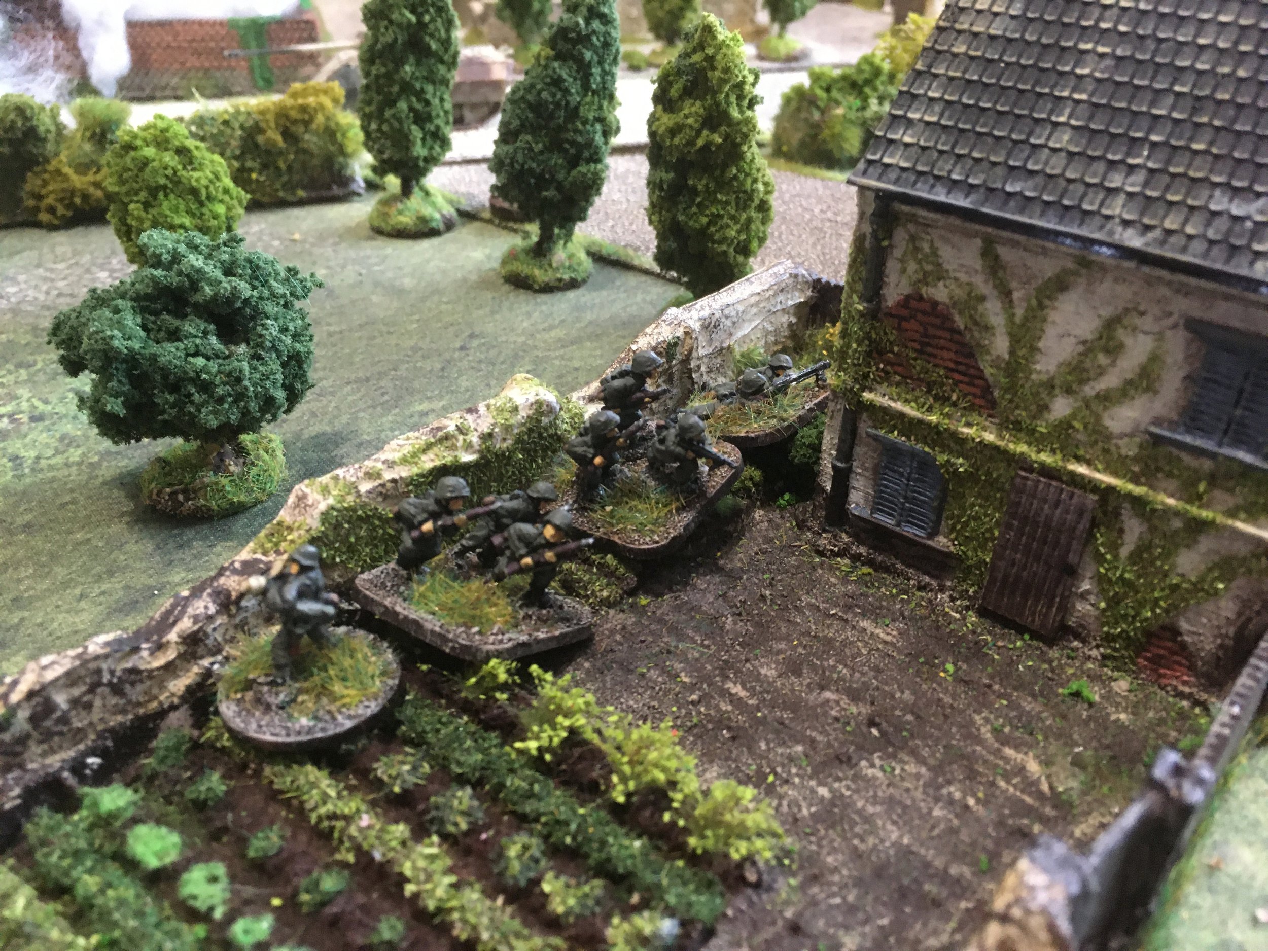 However one of the retreating Zugs of German infantry moved into the adjacent garden...