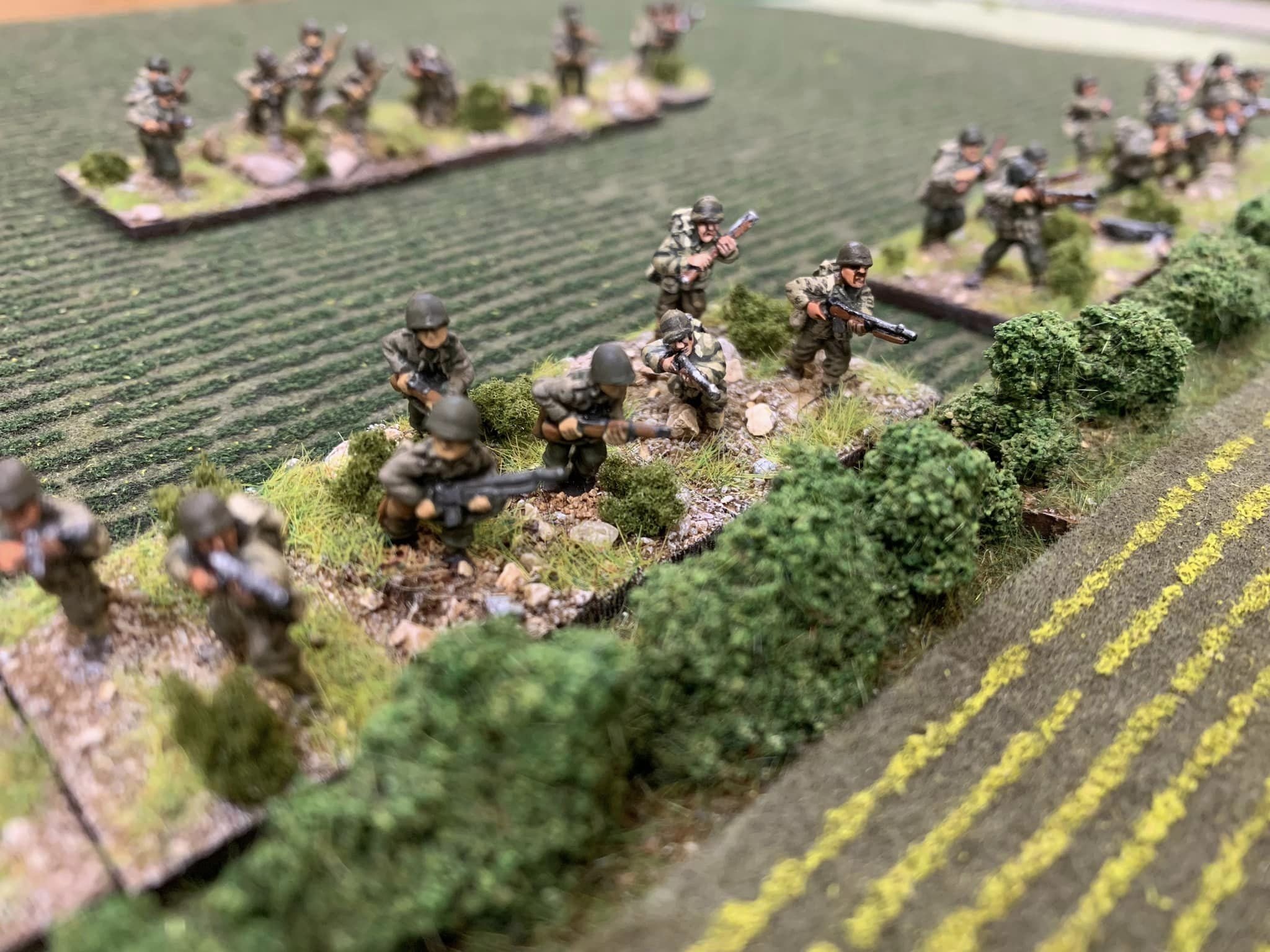 Full strength platoon advances after offloading from the regimental trucks